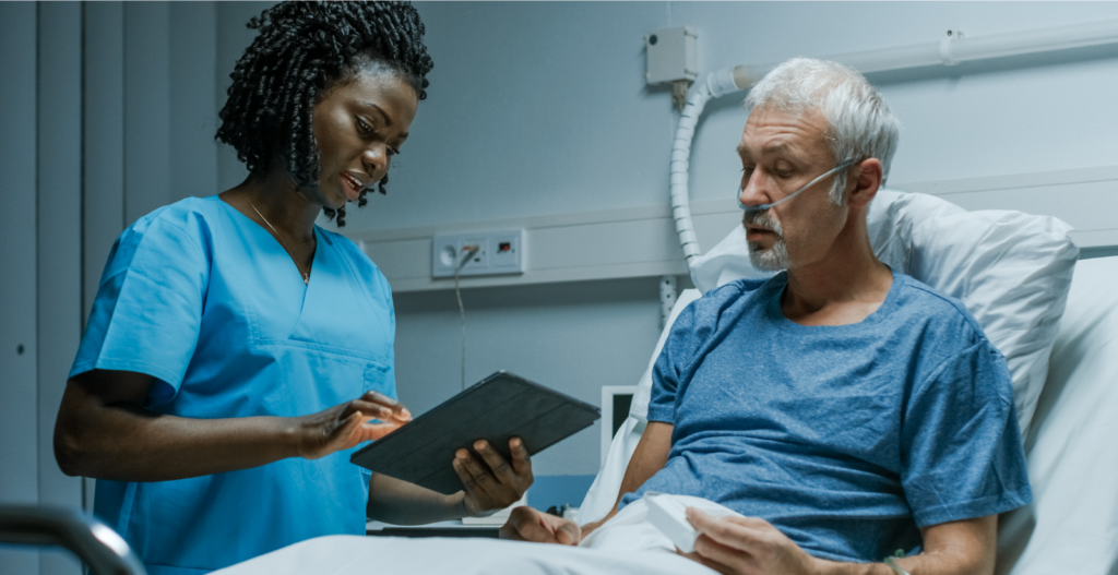 Healthcare predictions: Doctor and patient engaging with ipad