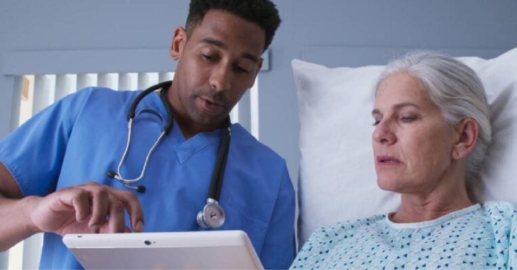 Nurse helping a patient understand instructions